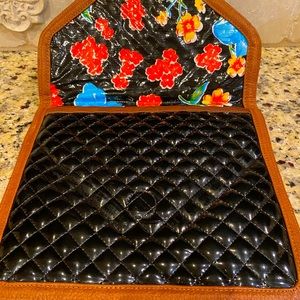 Consuela black quilted envelope tech bag